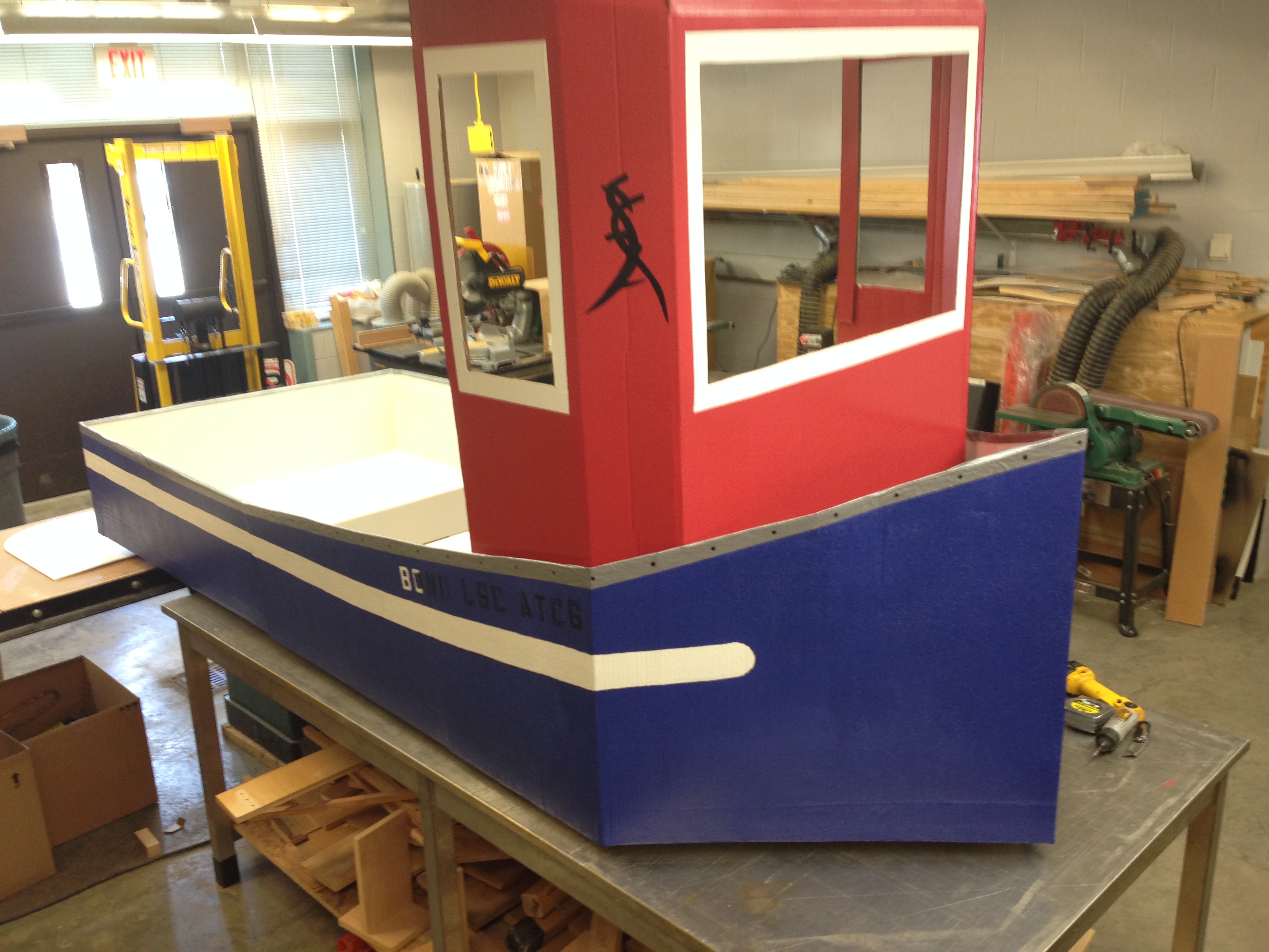 Made completely of cardboard and Popeye themed, Bond LSC facilities crew say this boat could be the winner of the 3rd Annual Flot Your Boat for the Food Bank Race on April 12 — BLANKENBUEHLER