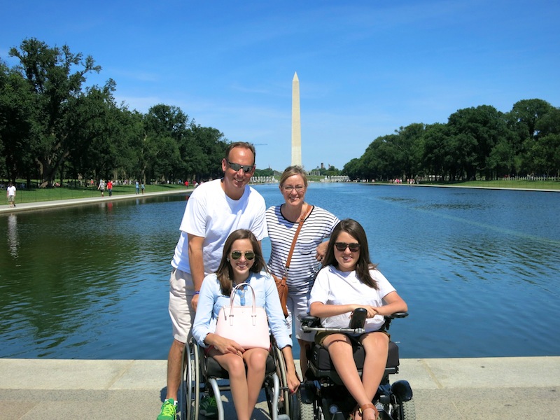 Time and Natalie Gibbs with their daughters Lauren, 17 (left) and Claire, 16 (right) in Washington D.C. The family have been visible advocates in the fight for a cure for spinal muscular atrophy. | Photo provided by the Gibbs family.