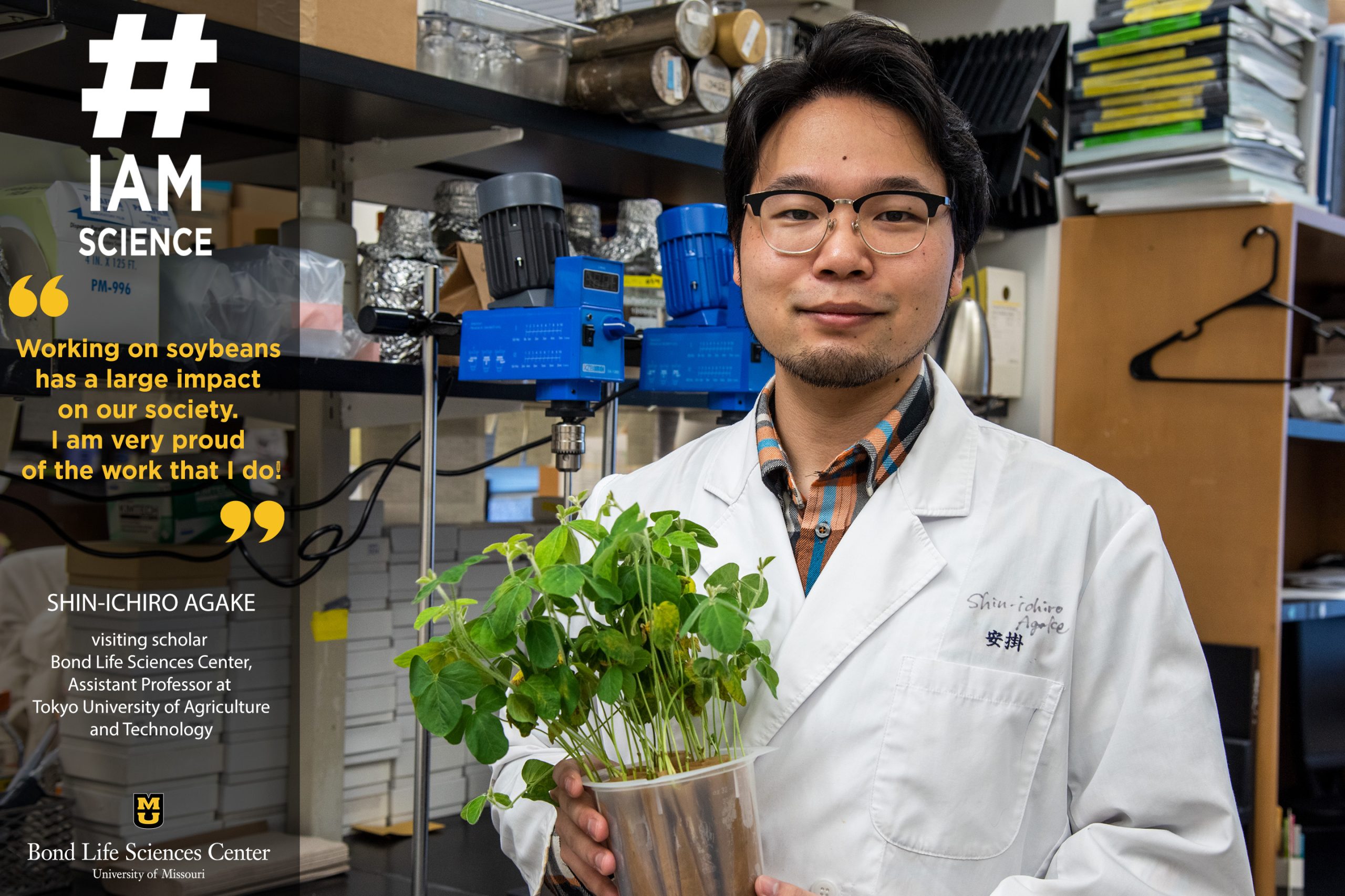 Image of Shin-Ichiro Agake holding a soybean plant. By Sarah Kiefer | Bond LSC