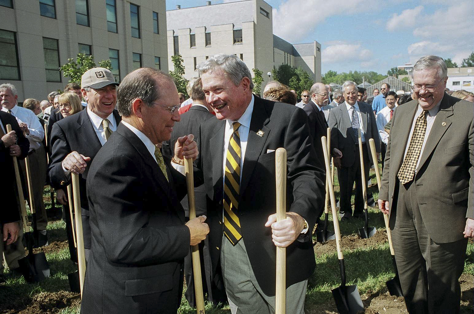 Kit Bond groundbreaking 2001 Kit Bond speaks to Thom Payne, vice chancellor for agriculture and dean of the College of Agriculture, Food and Natural Resources, at the groundbreaking for the Christopher S. Bond Life Sciences Center on September 8, 2001.